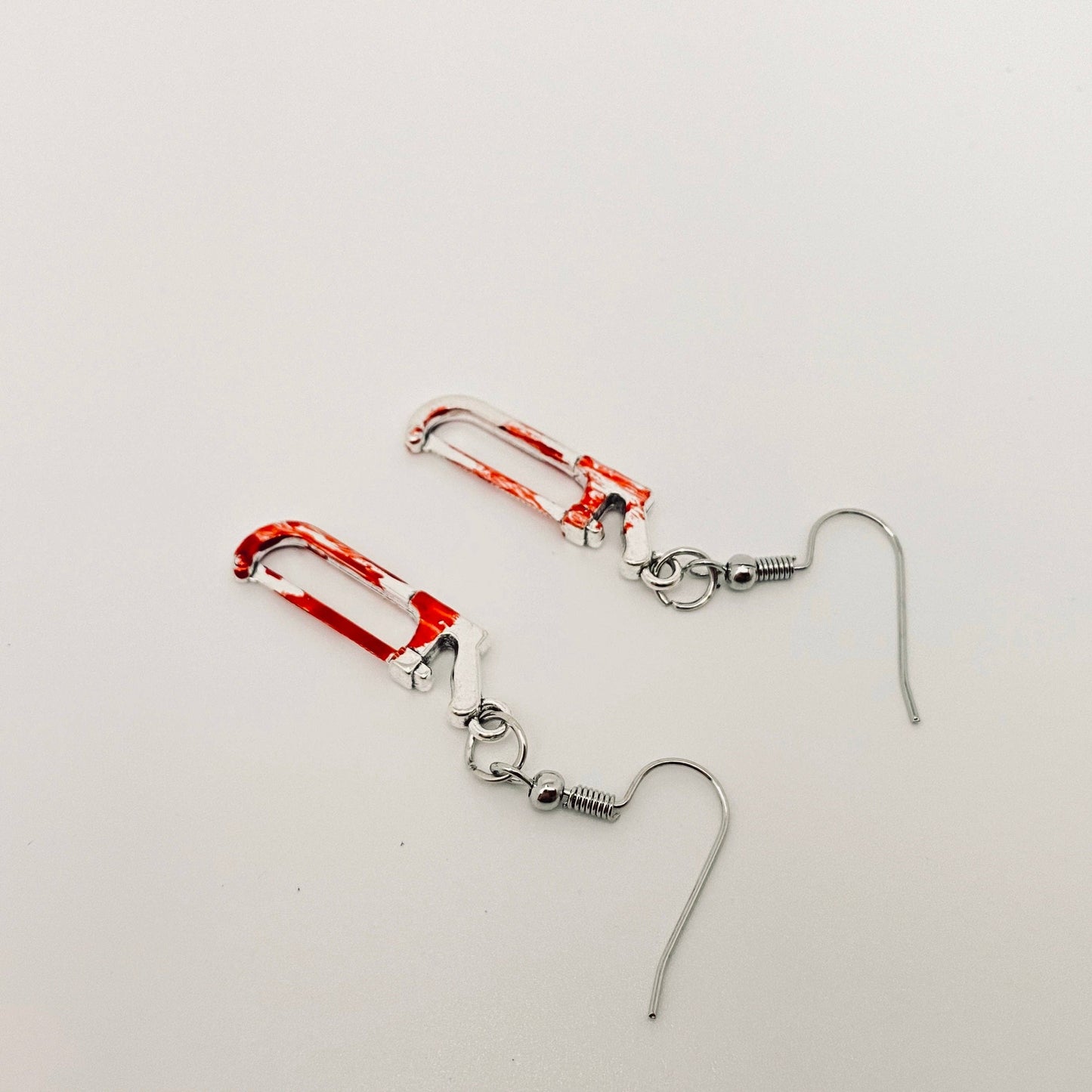 bloody metal saw earrings halloween